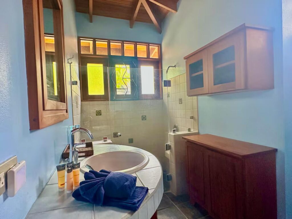 Large showers in all the bathrooms offer ample space to freshen up.