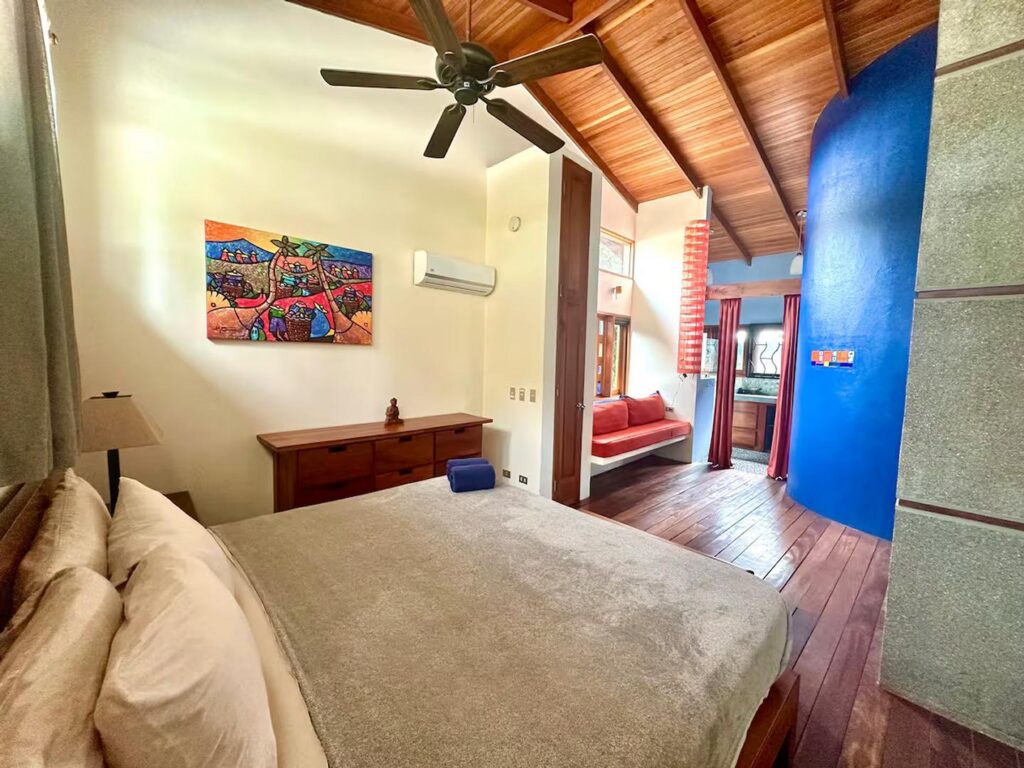 This luxury air-conditioned bedroom has a nice sitting area and ensuite bathroom.