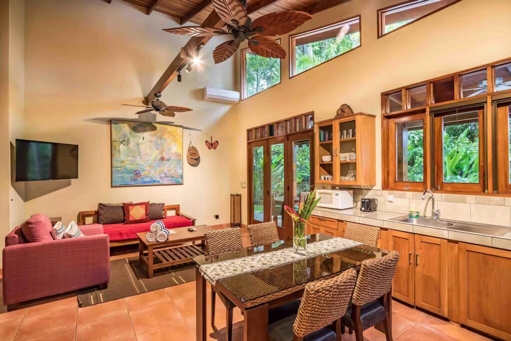 Air conditioning and hand-carved ceiling fans throughout the vacation home keep the air moving.
