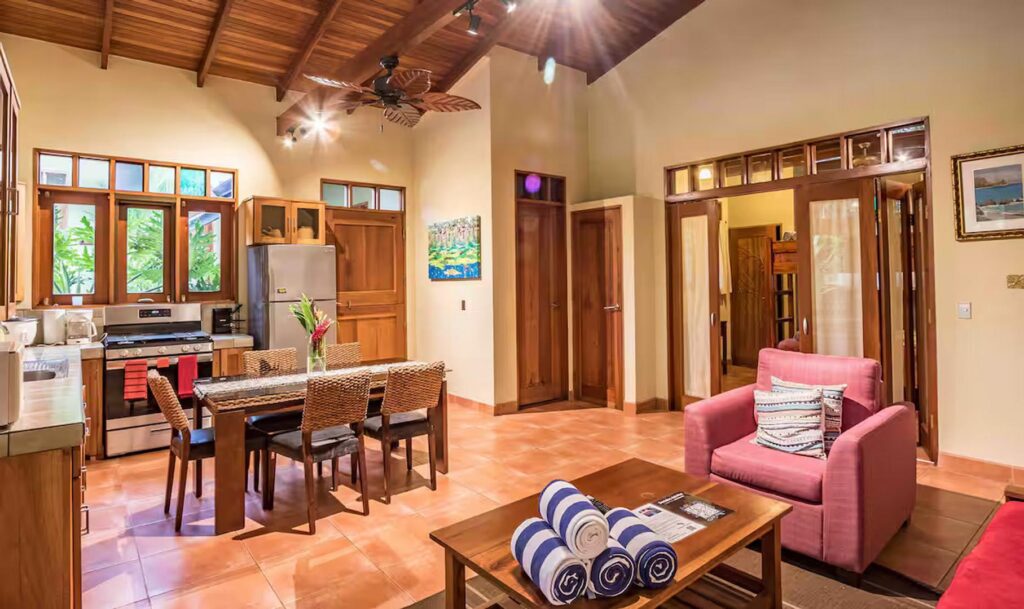 A natural ambience is created by handcrafted doors, window frames, and other wooden features.