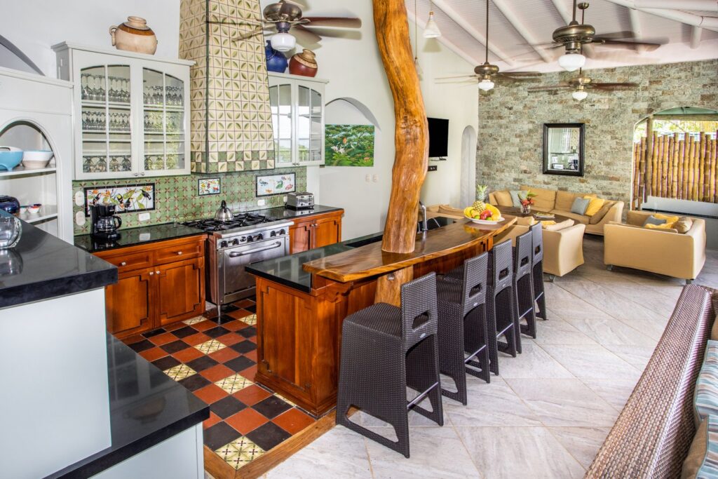 This impressive natural tree trunk is cleverly built right into the breakfast bar in the great room.