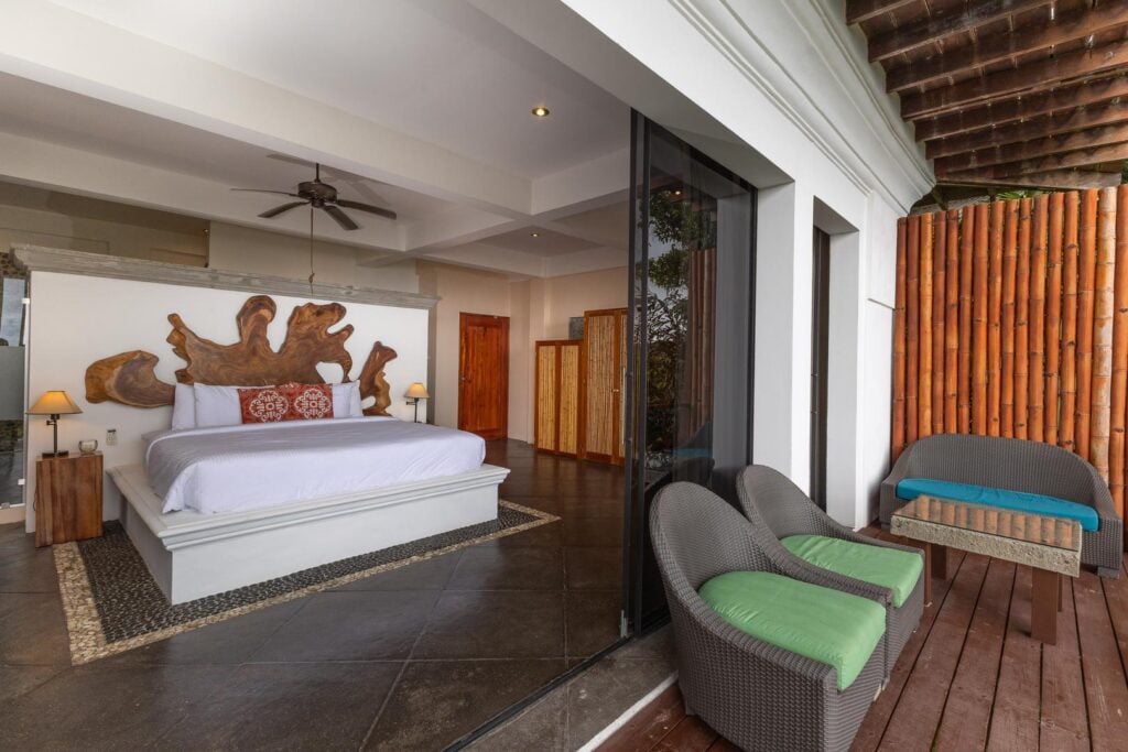 Wake up each morning to the sounds of rolling waves and a gorgeous view of the distant Manuel Antonio park.