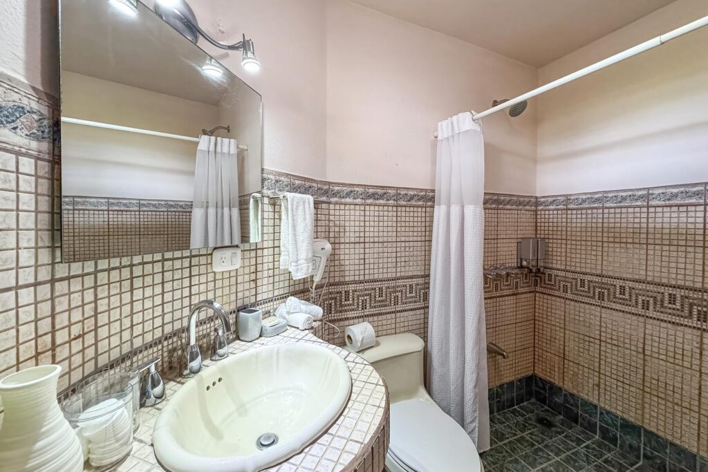 A clean and comfortable ensuite bathroom with a practical layout designed for everyday use.