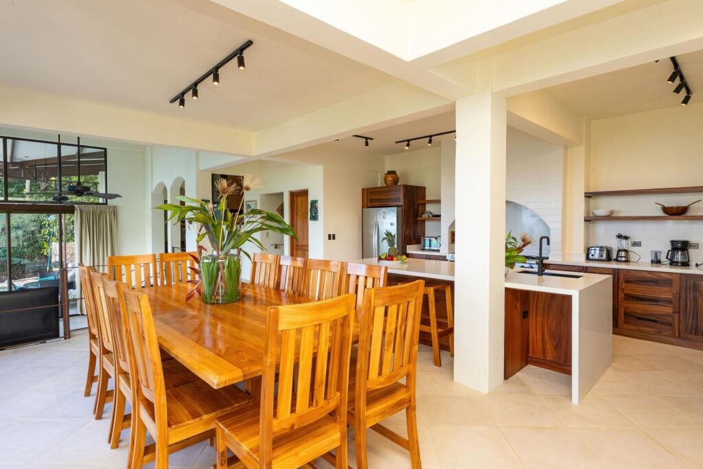 A warm, open kitchen and dining area designed for comfortable meals, easy conversation, and time spent together.