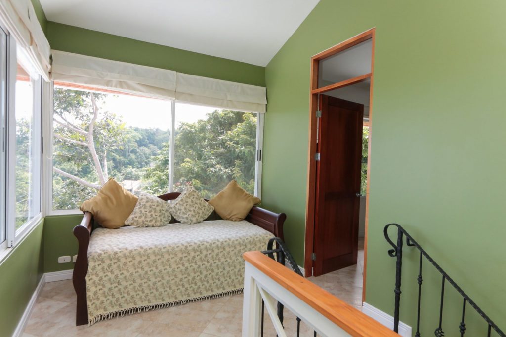 The master bedroom balcony with gorgeous jungle views is the perfect spot to enjoy a fresh morning coffee.