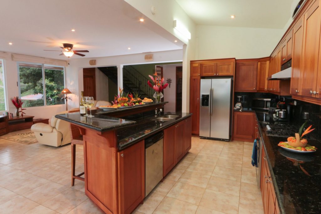 The modern gourmet kitchen is perfect for the chef in your family with a breakfast bar for folks to hang out.