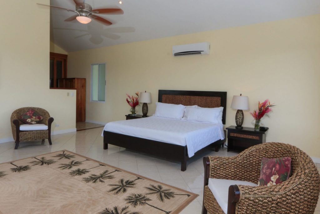 This fully air conditioned bedroom features lots of natural details.