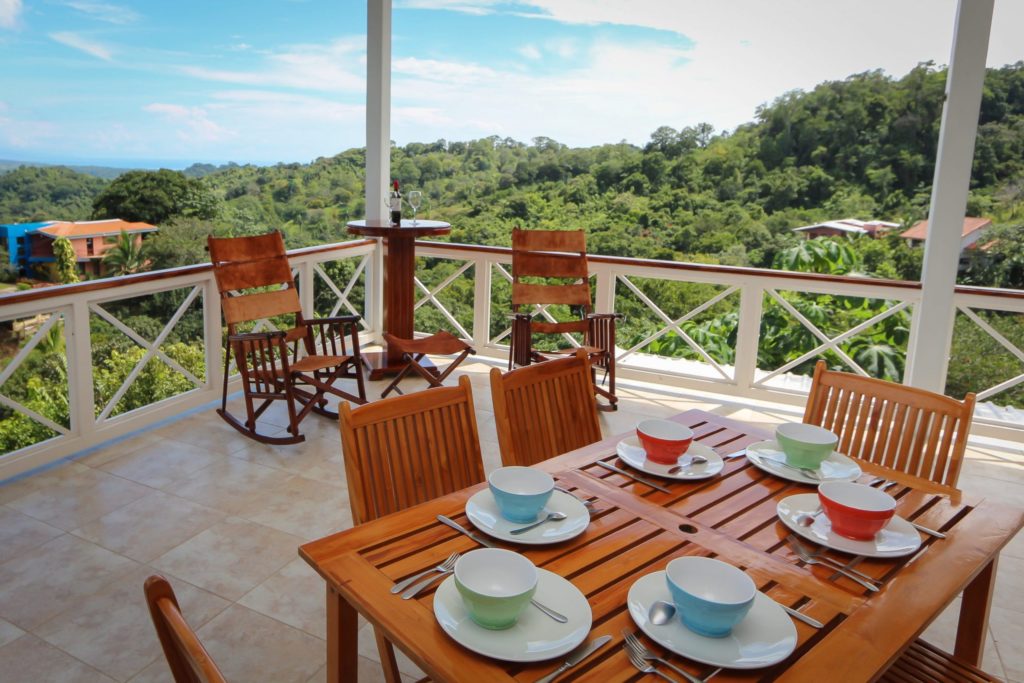 This outdoor sitting area with gorgeous jungle views is the perfect spot to enjoy a fresh morning coffee.