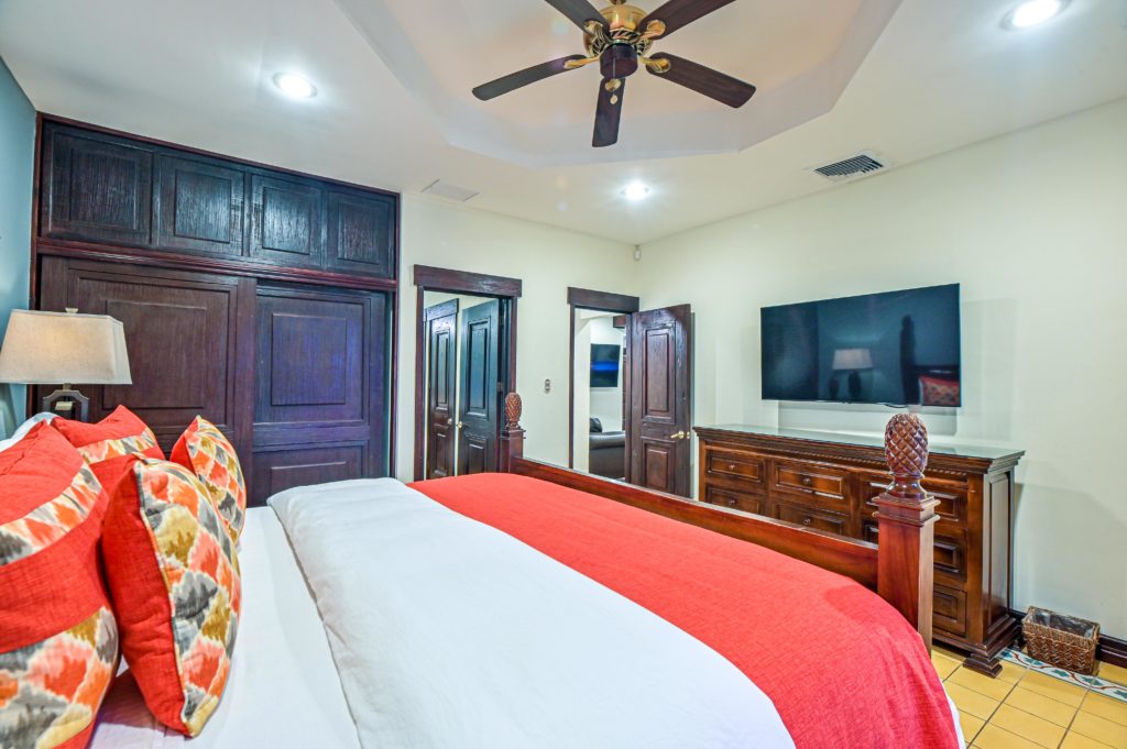 While on vacation, it's perfectly acceptable to indulge in some leisurely TV time in your sumptuously relaxing bedroom.