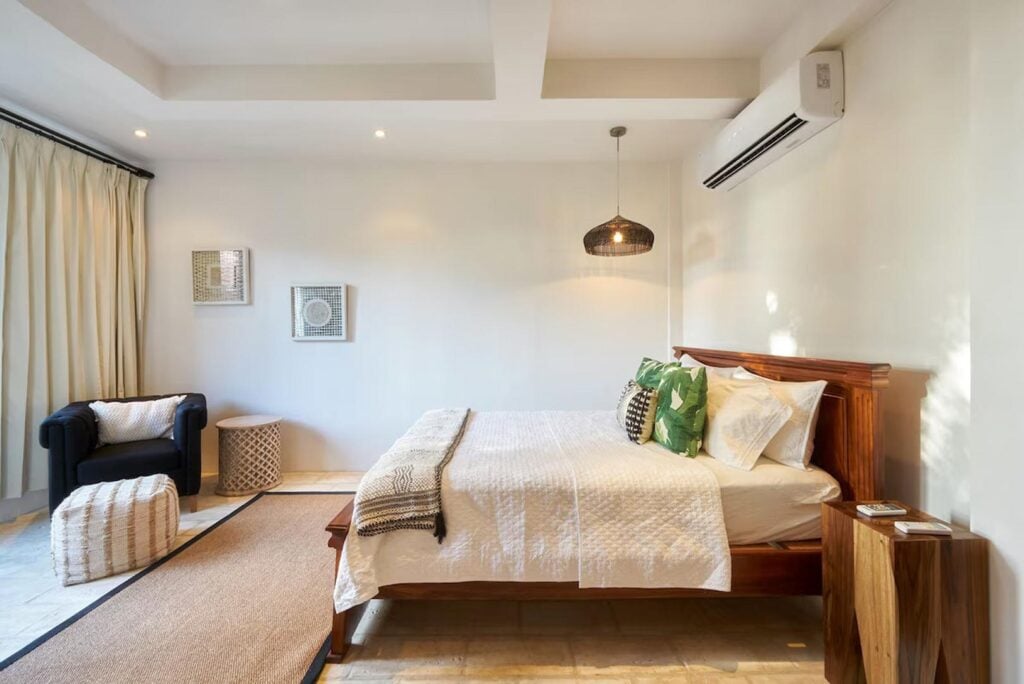 All seven bedrooms in this beautiful vacation home are decorated in a minimal yet natural style.
