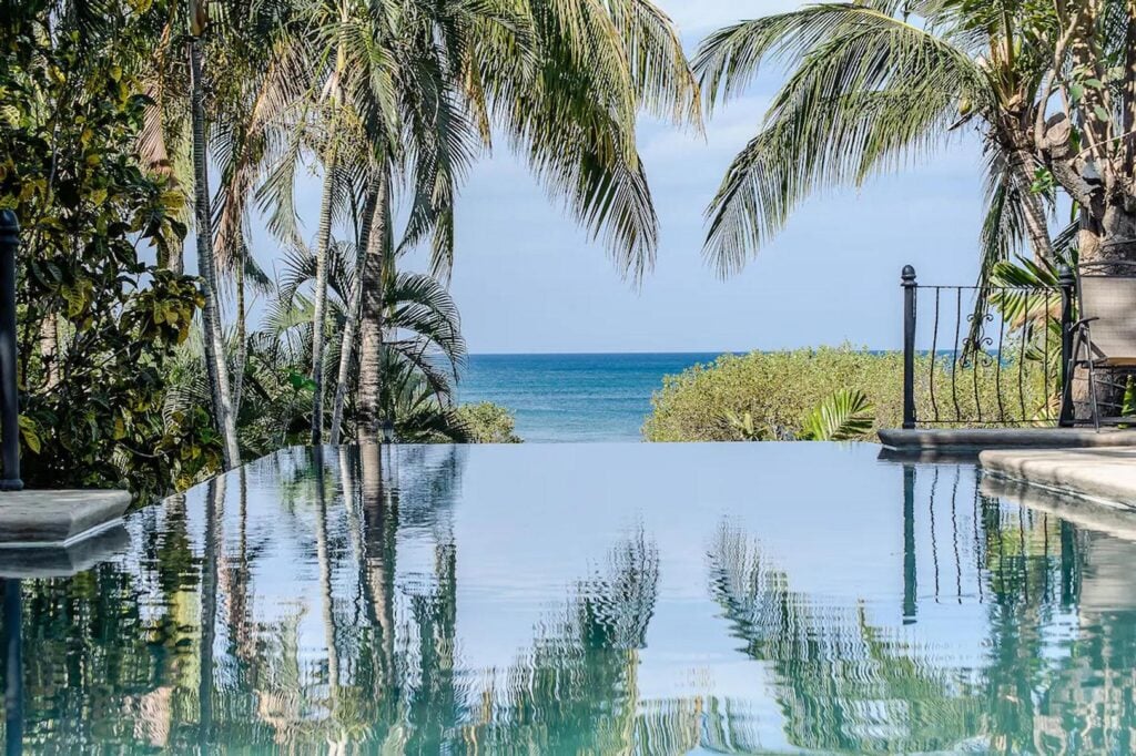 Admire this magnificent view of the Pacific from your refreshing infinity edge pool.