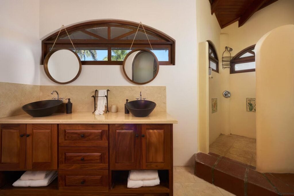 His and hers sinks in the huge master bathroom.