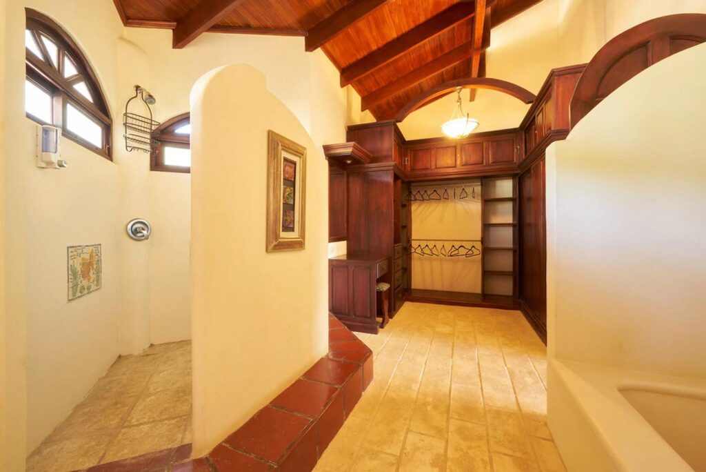 One end of the master bathroom offers a luxury walk-in closet with more than enough space.