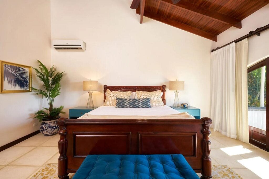 The master bedroom is tastefully decorated with the finest furniture.