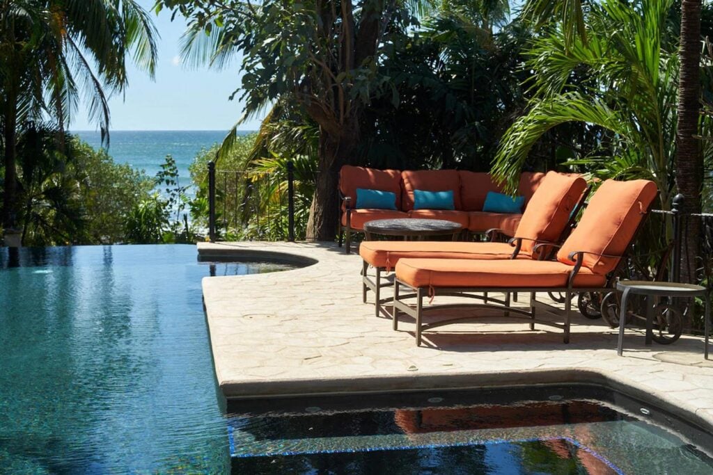 The plush seating and loungers around the pool, scattered between sun and shade, offer great places to relax throughout the day.