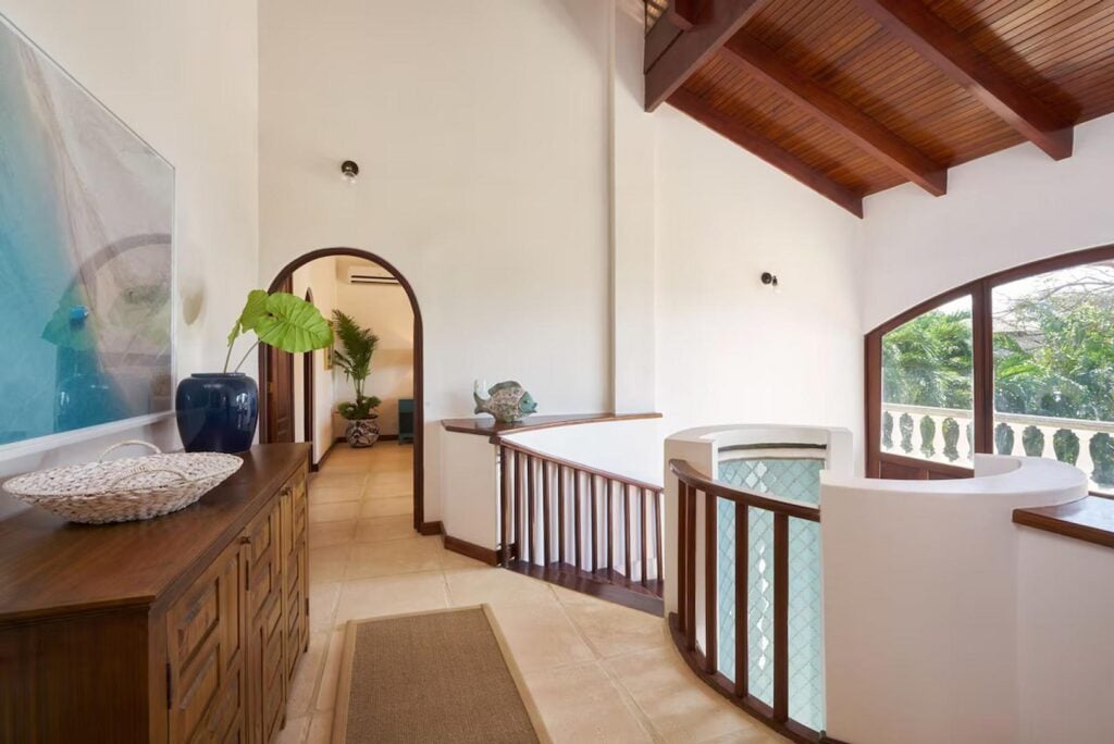 The upstairs landing is a bright and spacious area and from here you can fully appreciate the unique water feature of this home.