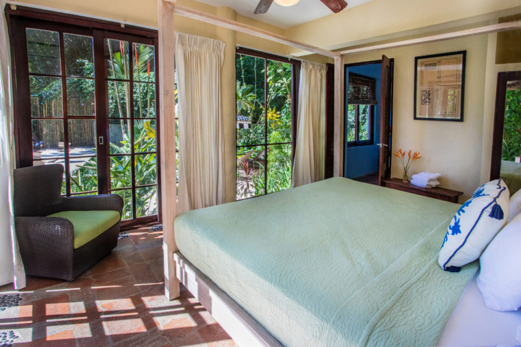 In this stunning vacation home, each of the four bedrooms in the main house is equipped with a king bed and a private bathroom.