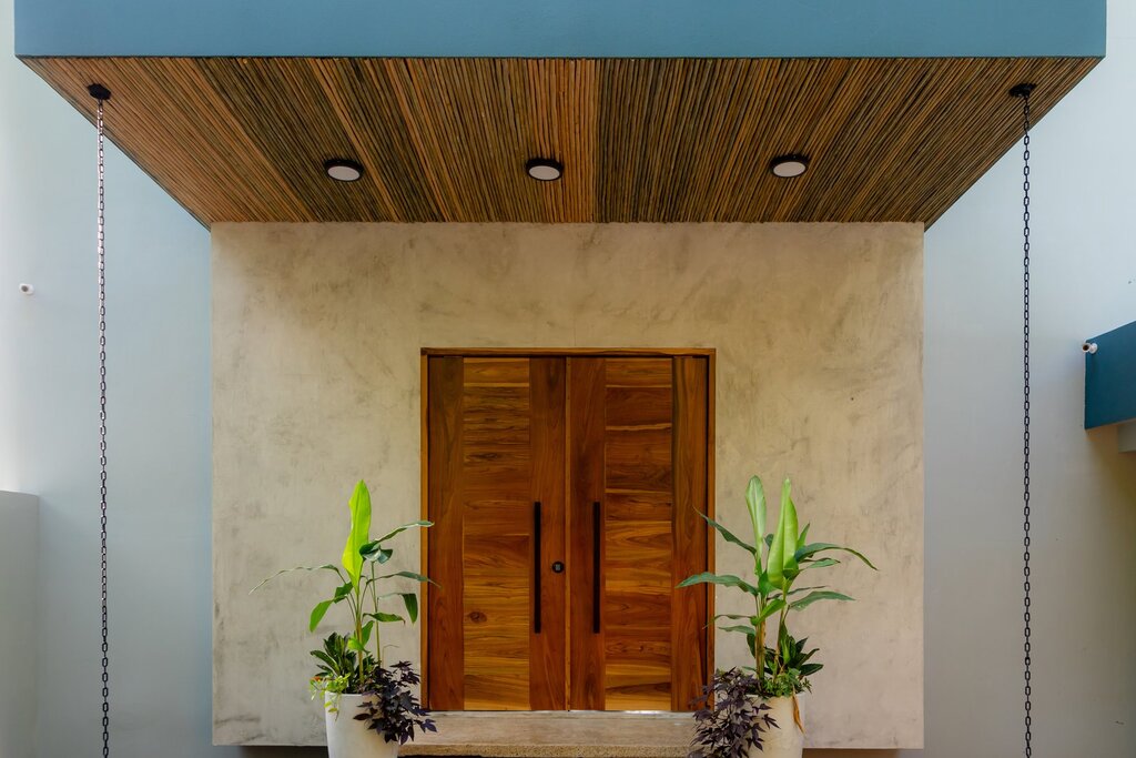 Feel welcomed when you first walk through the simple yet bold entrance to the villa.