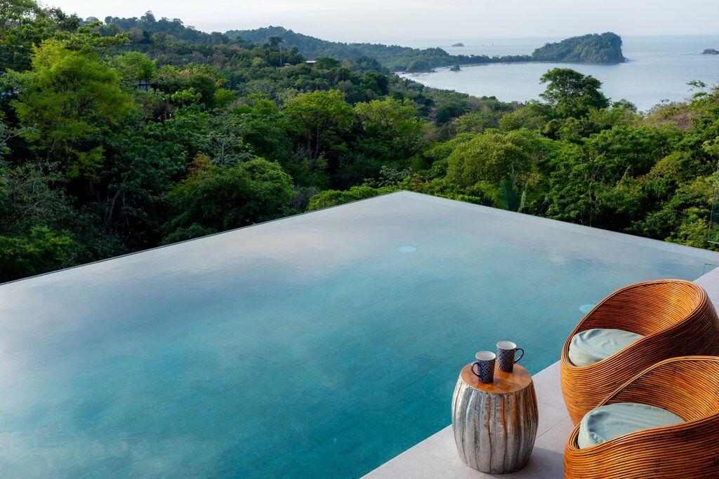 The view of the rainforest and ocean from your stunning infinity pool will leave you speechless.