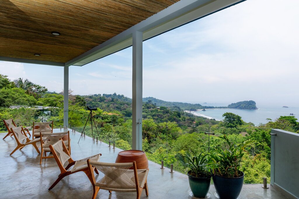 Relax while you enjoy the view from your terrace with beautiful chairs and a small telescope.
