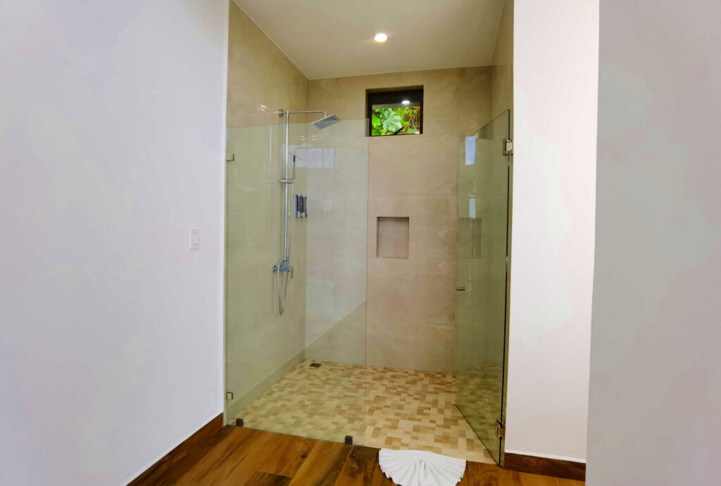 Freshen up in this luxurious and spacious private shower.