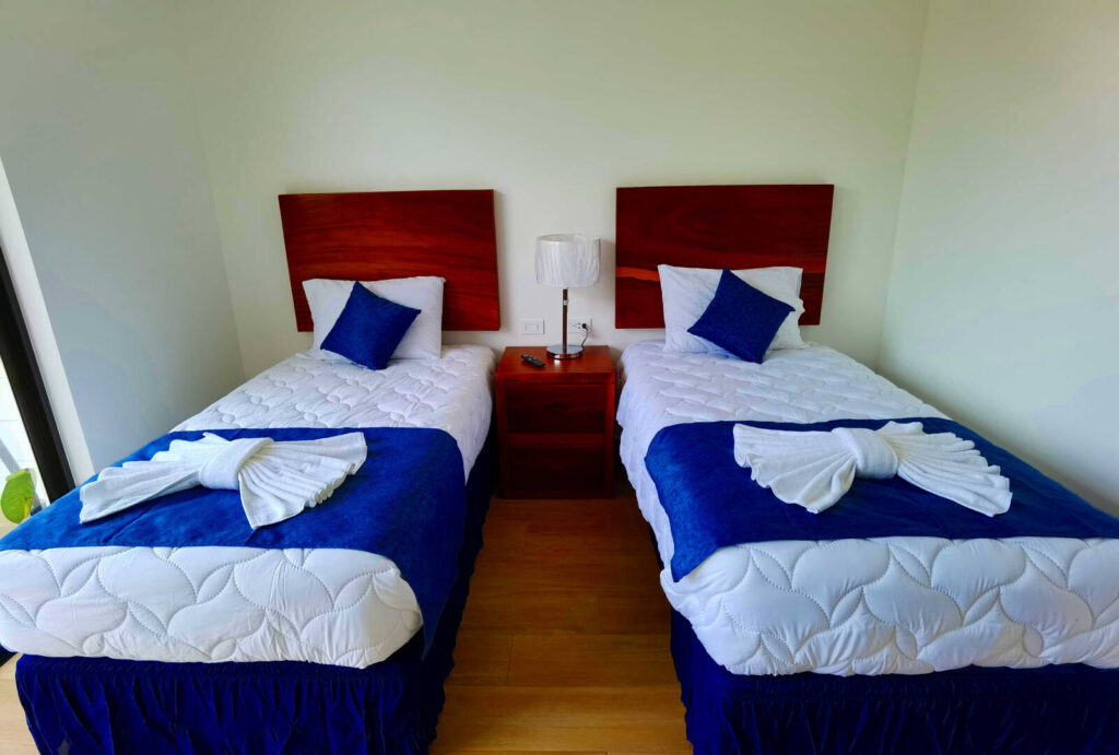 These two comfortable single beds are ready for two young adventurers at the end of a fun-filled day in Manuel Antonio.