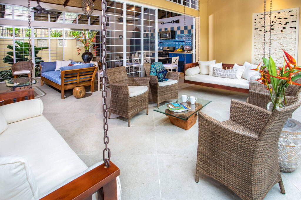The villa features indoor and outdoor living spaces that can open up and combine to create a huge entertainment area. 