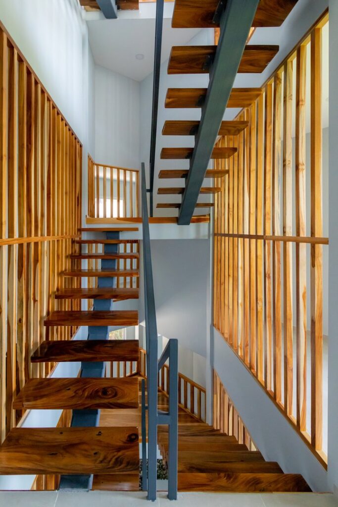 The gorgeous perfectly-designed wooden stairs take the guests to every part of the property.