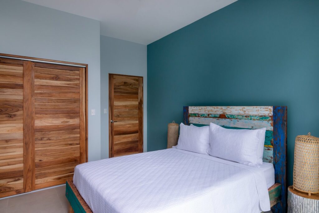 The calming blue bedrooms are spacious with plenty of storage space.