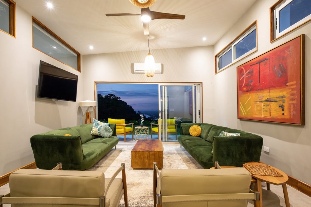 The large living area is the perfect place to unwind and enjoy the evening mountain breeze.