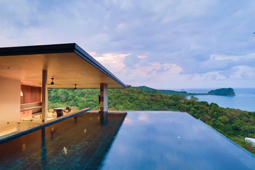 The rooftop infinity saltwater pool of this stunning villa has one of the best views in all of Manuel Antonio.
