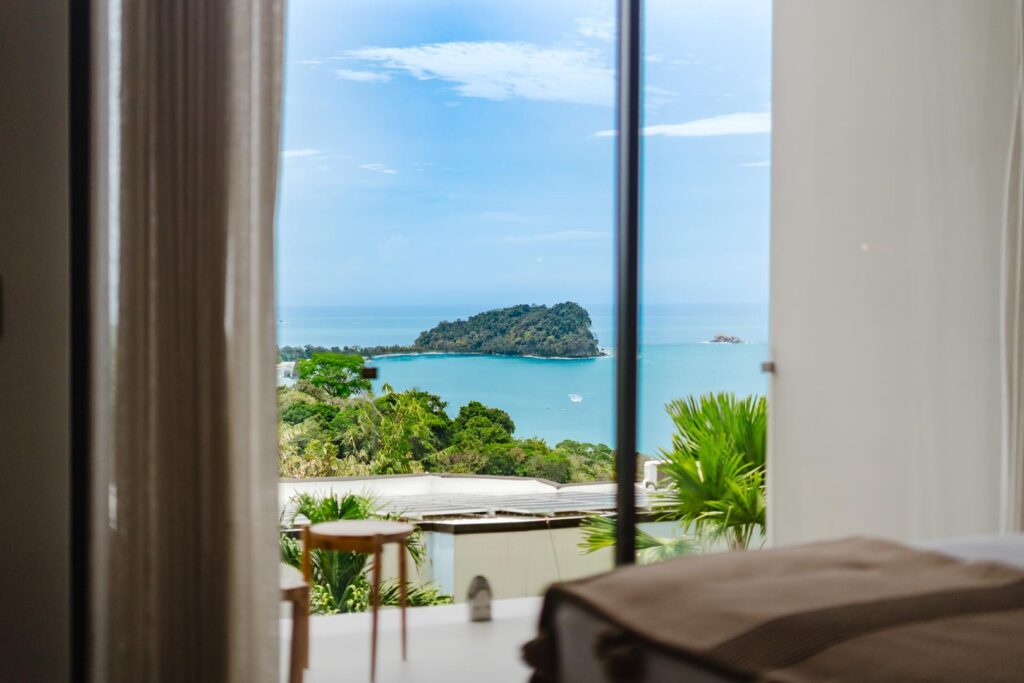 A view that draws you outside—Cathedral Point and the Pacific just beyond your room.