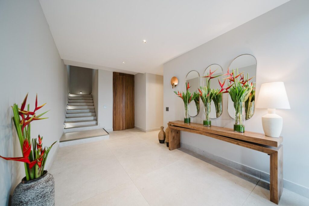 A clean, welcoming foyer with natural textures and thoughtful design accents.