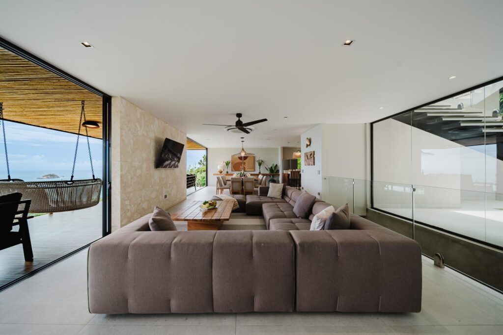 An open-concept living space that flows seamlessly to ocean-view terraces.