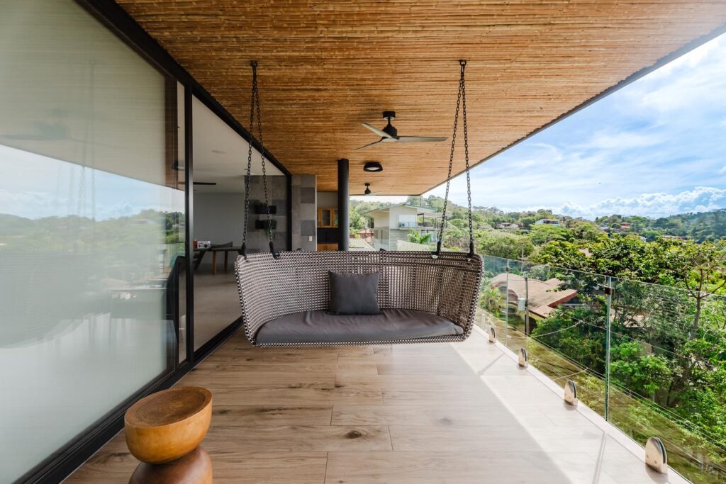 A suspended swing seat invites you to relax and take in the views.
