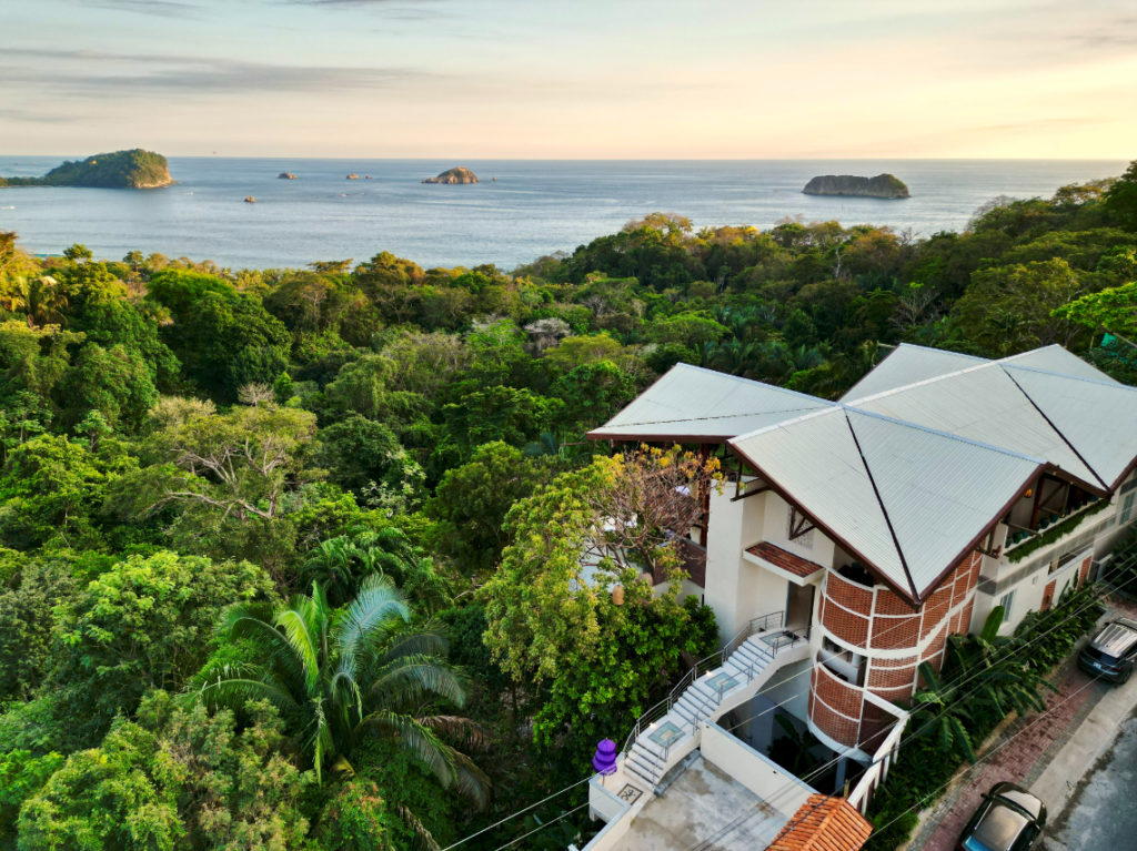 Immerse yourself in the enchantment of Manuel Antonio, Costa Rica, a captivating town where the breathtaking beach landscape effortlessly blends with the vibrant biodiversity of the surrounding lush forest.