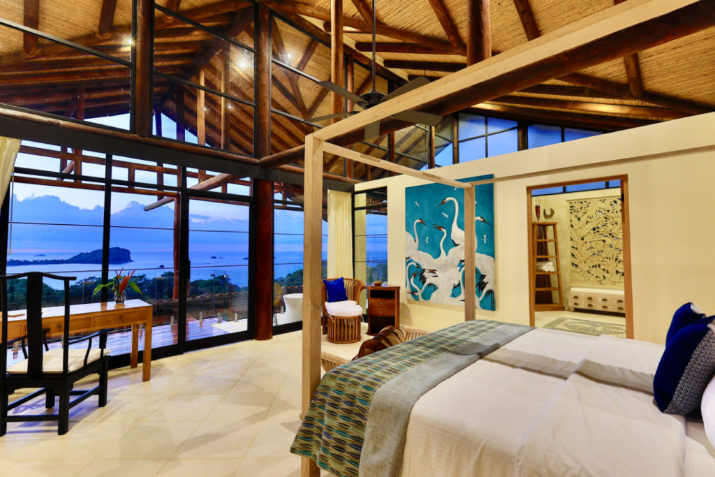 floor-to-ceiling-glass-doors-provide-exclusive-ocean-vistas-of-manuel-antonio