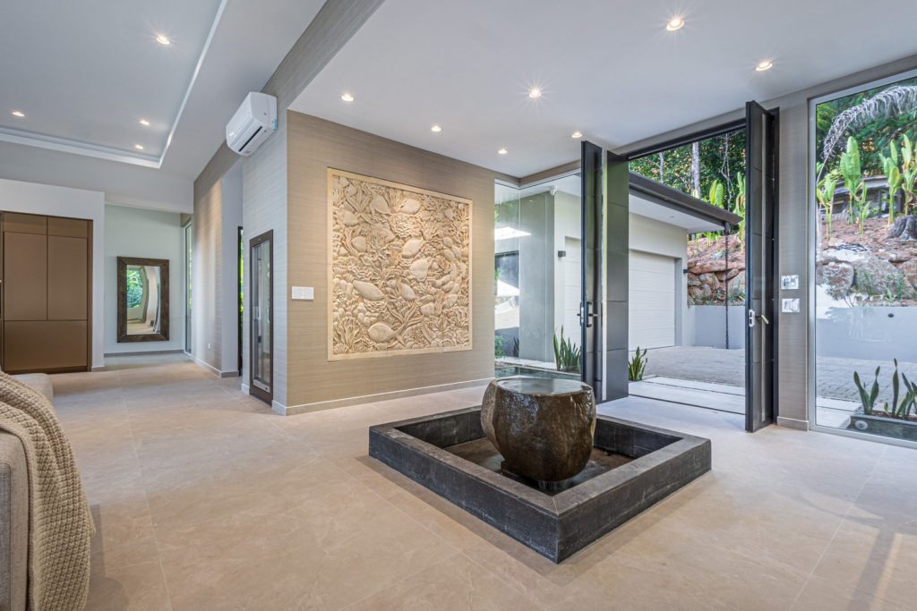 Step into a world of modern sophistication in the beautifully-decorated entrance to the villa.