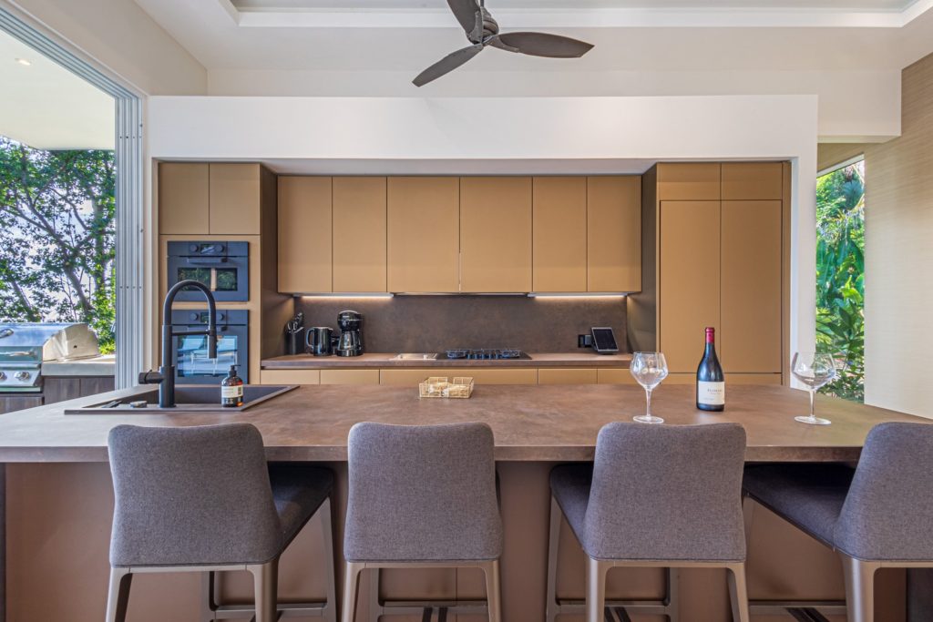 Refined design seamlessly blends with practicality in this gourmet kitchen, perfect for enjoyable gatherings.