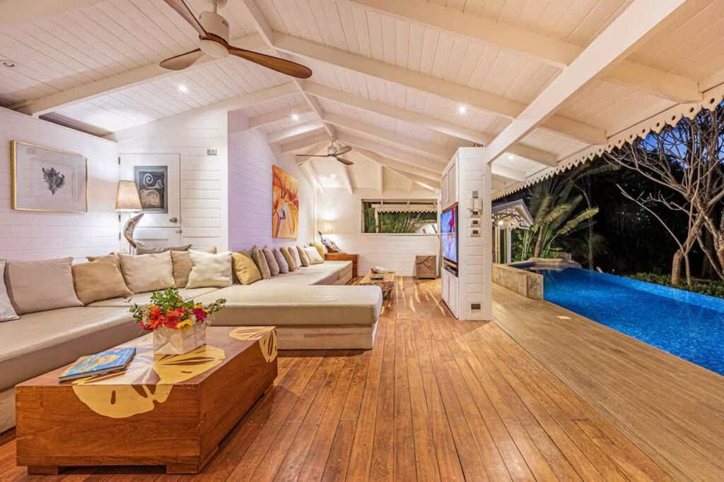 This house is perfect for evening pool parties with plenty of plush seating for those who prefer to just watch.