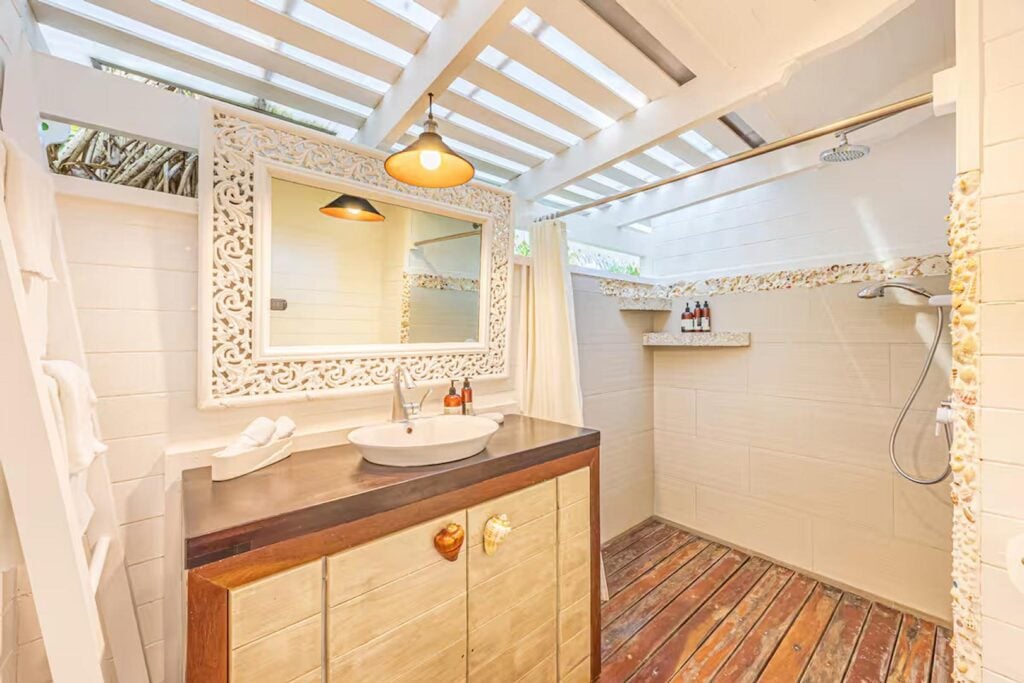 Even the bathrooms are carefully decorated with handcrafted details and natural shells.