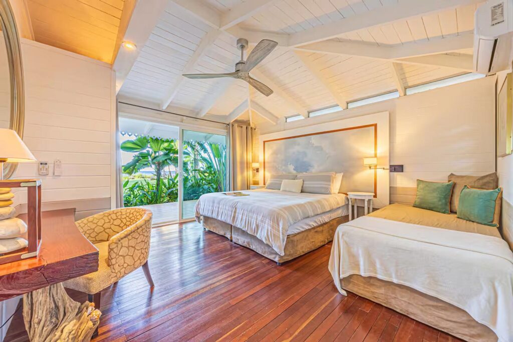 The white woodwork and vaulted ceilings in every part of the villa create a bright Caribbean architectural style. 