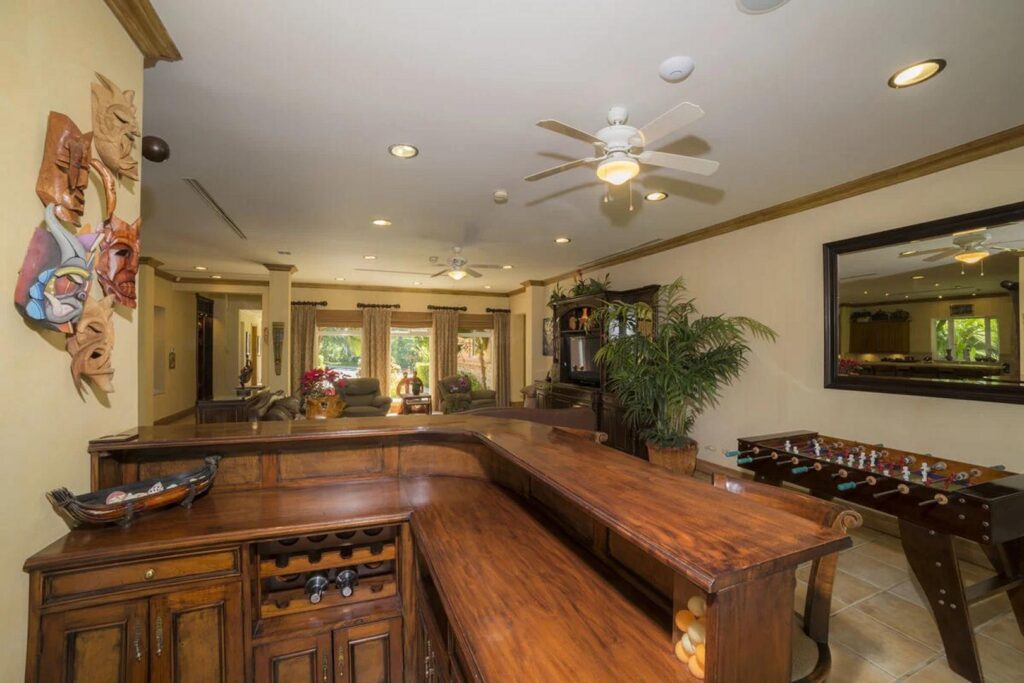 Evenings at this vacation home are ideal for gatherings with a bar in the games area.