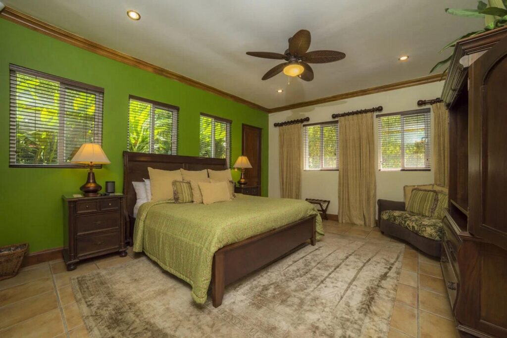 The handcrafted wooden furniture and features in this bedroom give it a timeless natural vibe.
