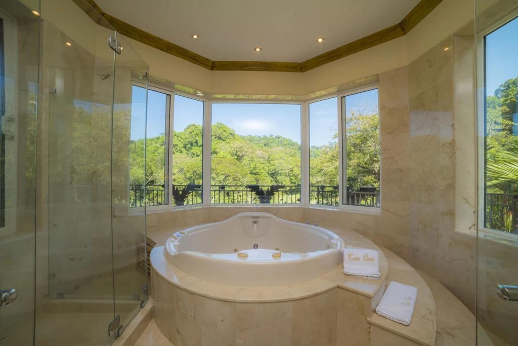 A jacuzzi tub with panoramic views is one of the best features in the bathroom of the master bedroom.