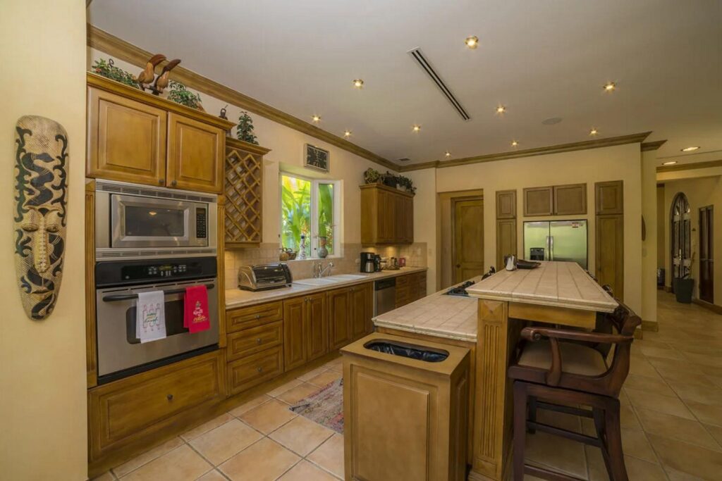 The modern kitchen has all the high-end kitchen appliances needed to prepare meals for your group.