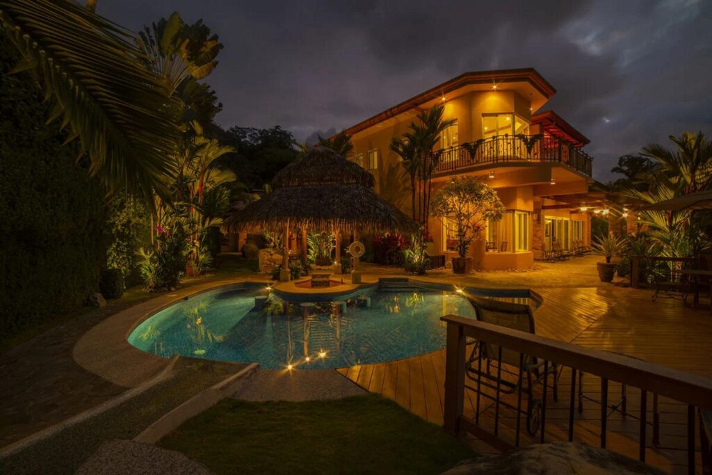 An outdoor evening pool party with music and drinks is a must at this incredible luxury villa.