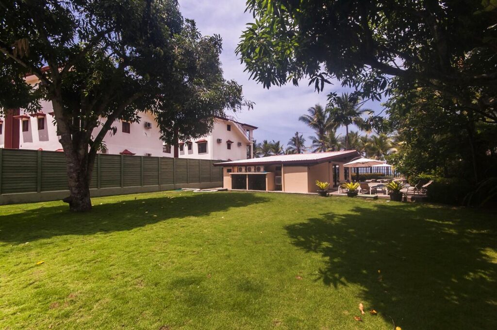The backyard lawn is great for games or spotting fresh mangoes that drop from the trees.