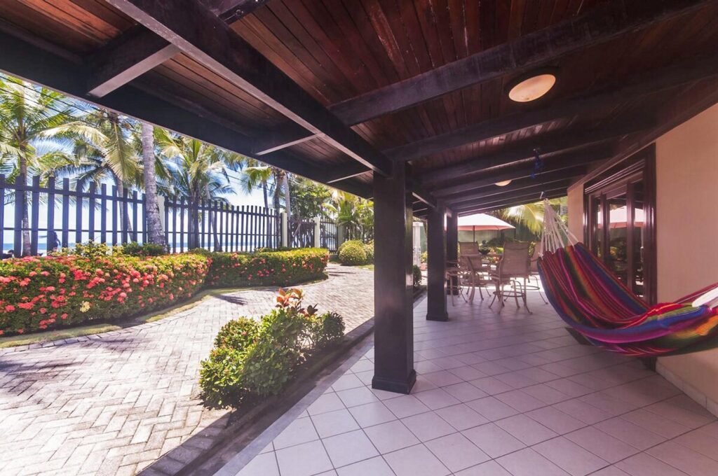 The shaded terrace is ideal for reading, napping, or simply escaping the afternoon sun.