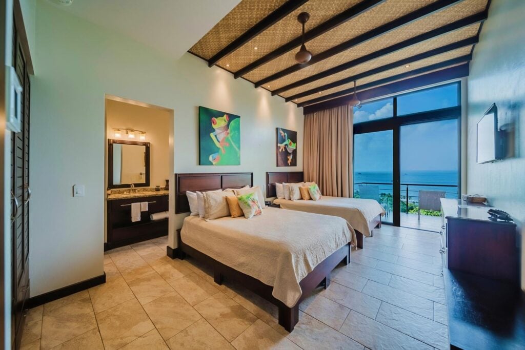Spacious bedrooms with ocean views make it easy for families to relax together in comfort.